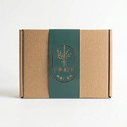Pack individual items into a box with a Shop moi ça sleeve.