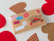 Tablette de chocolat noir aux fruits rouges